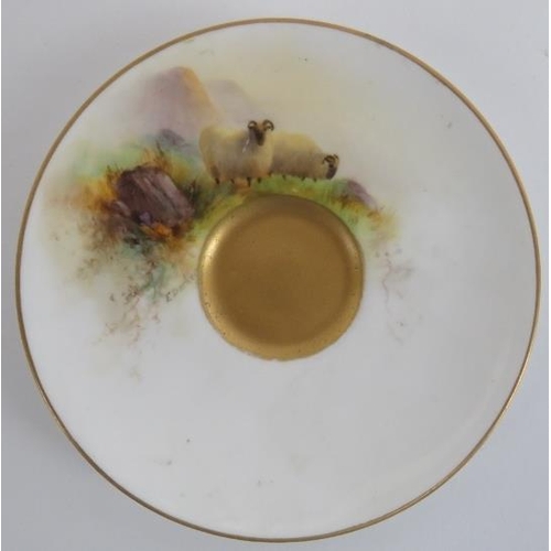 82 - A Royal Worcester gilt polychrome painted porcelain coffee cup and saucer, circa 1914. With a gilt i... 