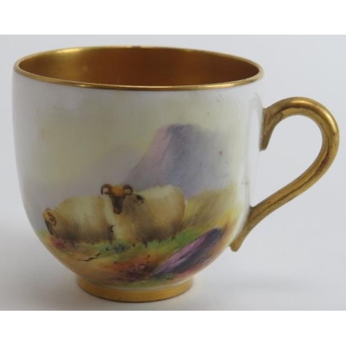 82 - A Royal Worcester gilt polychrome painted porcelain coffee cup and saucer, circa 1914. With a gilt i... 