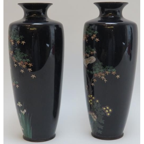 86 - A pair of Japanese cloisonné enamelled vases, Meiji period. Decorated with flowers and birds amongst... 