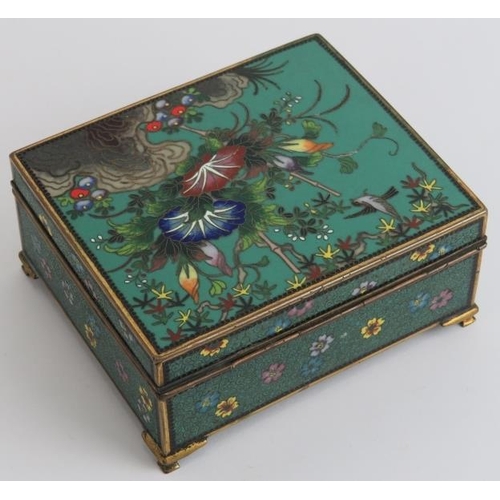 89 - A Japanese cloisonné enamelled jewellery trinket box, Meiji period. The hinged cover decorated with ... 