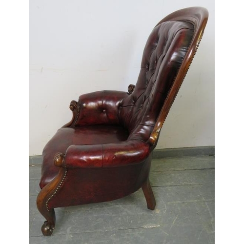 707 - A Victorian mahogany spoonback chair to match previous lot, upholstered in burgundy leather with bra... 