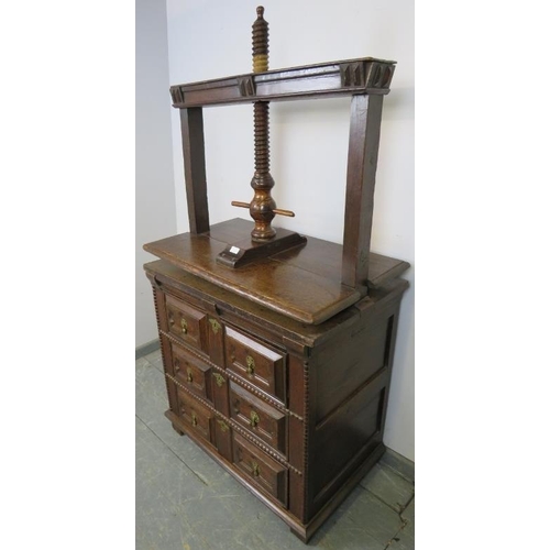 711 - A 17th century William & Mary oak chest with elm press, above three long drawers with geometric moul... 