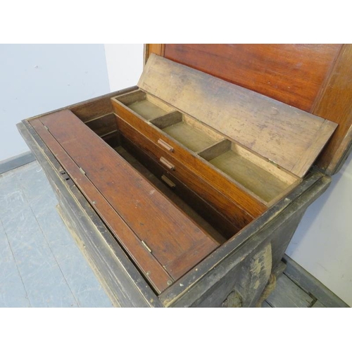 715 - A 19th century metal bound carpenter’s trunk, the bespoke mahogany fitted interior housing a selecti... 