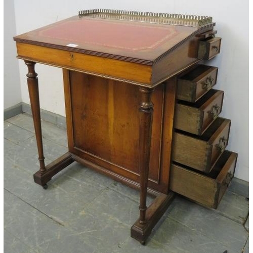 724 - A reproduction Yew wood Davenport, with brass ¾ gallery and inset red leather writing surface, housi... 