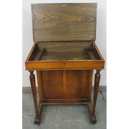 724 - A reproduction Yew wood Davenport, with brass ¾ gallery and inset red leather writing surface, housi... 