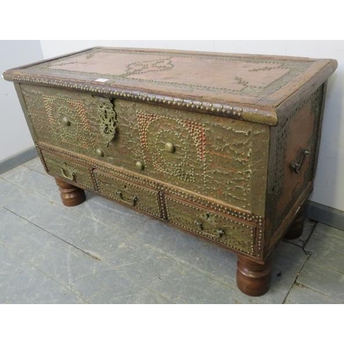 726 - An antique camphorwood Zanzibar chest, decorated with an abundance of brass studs and pierced copper... 