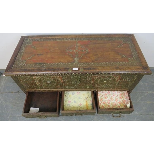 726 - An antique camphorwood Zanzibar chest, decorated with an abundance of brass studs and pierced copper... 