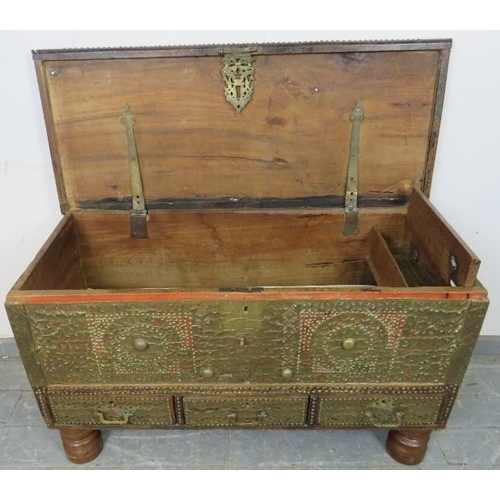 726 - An antique camphorwood Zanzibar chest, decorated with an abundance of brass studs and pierced copper... 