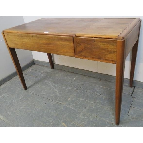 728 - A vintage Art Deco style rosewood writing desk retailed by Heal & Son, having a flip-up stationary c... 