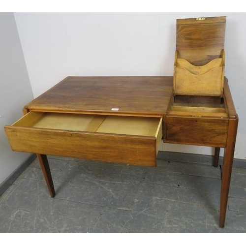 728 - A vintage Art Deco style rosewood writing desk retailed by Heal & Son, having a flip-up stationary c... 