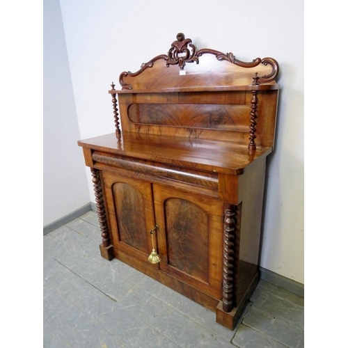 748 - A Victorian mahogany chiffonier, with barley twist uprights, housing one long blind drawer above pan... 