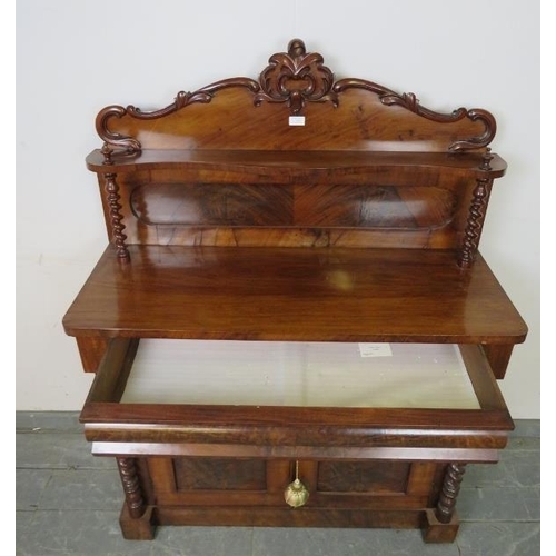 748 - A Victorian mahogany chiffonier, with barley twist uprights, housing one long blind drawer above pan... 