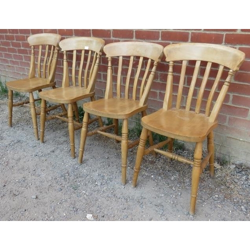 754 - A set of four beech slat-back farmhouse kitchen chairs, on turned canted supports with an ‘H’ stretc... 