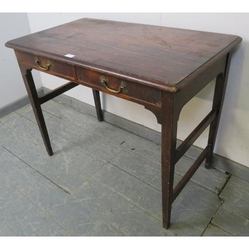 756 - A Georgian mahogany side table, housing two short drawers with brass bail handles, on tapering squar... 