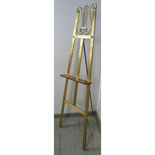 763 - A vintage gilt brass floor-standing artist’s easel with lyre back.
H165cm W55cm D44cm (approx).
Cond... 