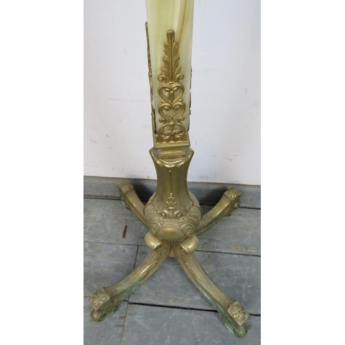 764 - A vintage floor-standing onyx and gilt metal coat stand, having four rotating hooks with an asparagu... 