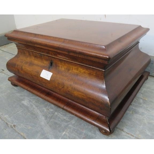 770 - A 19th century mahogany stationary box, of casket form, on bun feet. 
H21cm W41cm D31cm (approx).
Co... 