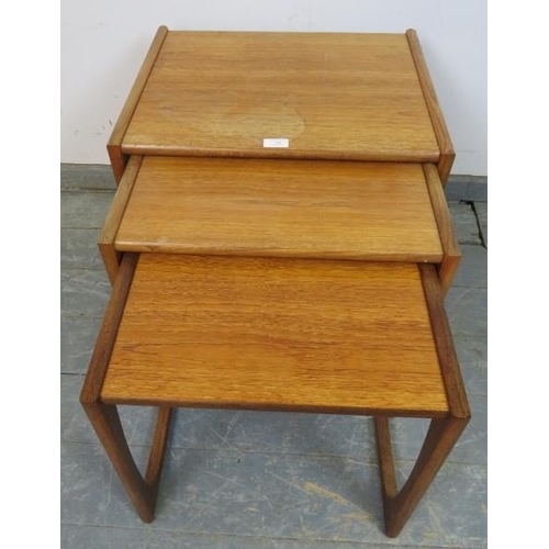 780 - A set of three mid-century teak ‘Quadrille’ G-Plan nesting tables, on rail supports. 
H49cm W53cm D4... 