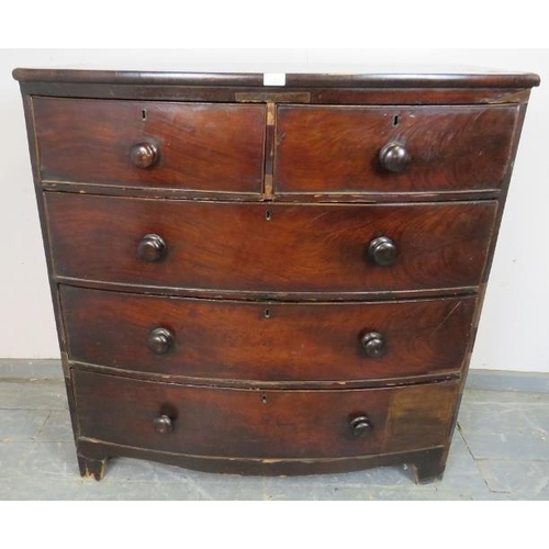 783 - A Georgian mahogany bow-fronted chest of two short over three long graduated cock-beaded drawers wit... 