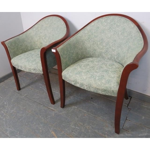 785 - A pair of Parker Knoll mahogany tub chairs in the Regency taste, upholstered in paisley material, on... 