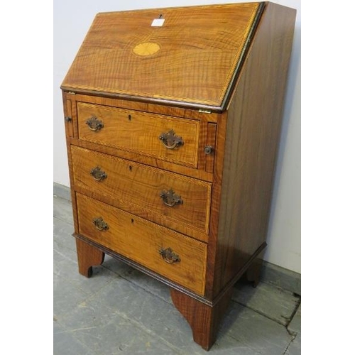 792 - An Edwardian rosewood bureau of small proportions, cross banded, strung with satinwood and featuring... 