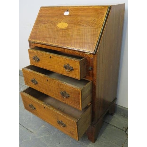 792 - An Edwardian rosewood bureau of small proportions, cross banded, strung with satinwood and featuring... 