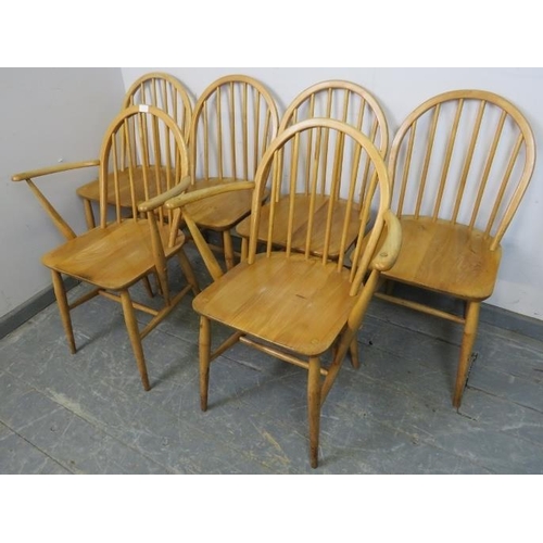 794 - A set of six (4+2) mid-century blonde elm and beech Windsor dining chairs by Ercol, on canted suppor... 