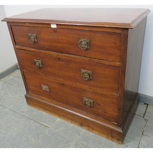 798 - An Edwardian mahogany chest of three long drawers with Arts & Crafts brass drop-ring handles, on a p... 