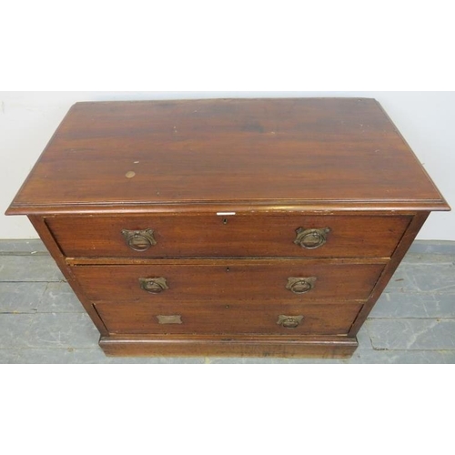 798 - An Edwardian mahogany chest of three long drawers with Arts & Crafts brass drop-ring handles, on a p... 