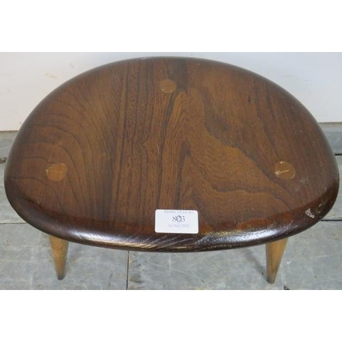 803 - A small mid-century elm and beech ‘pebble’ table by Ercol, on canted supports.
H33cm W34cm D24cm (ap... 