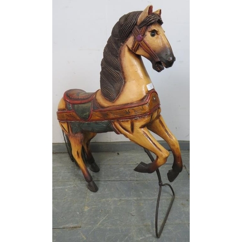 822 - A vintage child’s hand-decorated carved wooden carousal horse. 
H87cm W67cm D27cm (approx).
Conditio... 