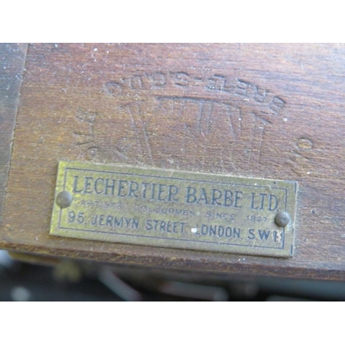 837 - An antique folding portable artist’s easel by Lechertier Barbe of Jermyn Street, on a tripod stand. ... 