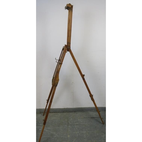 838 - An antique folding portable artist’s easel, on a tripod stand.
H172cm W65cm D108cm (approx).
Conditi... 