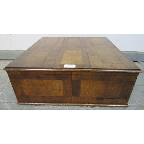 846 - An early 20th century walnut box with parquetry inlay, the hinged lid opening onto a sheet music lin... 