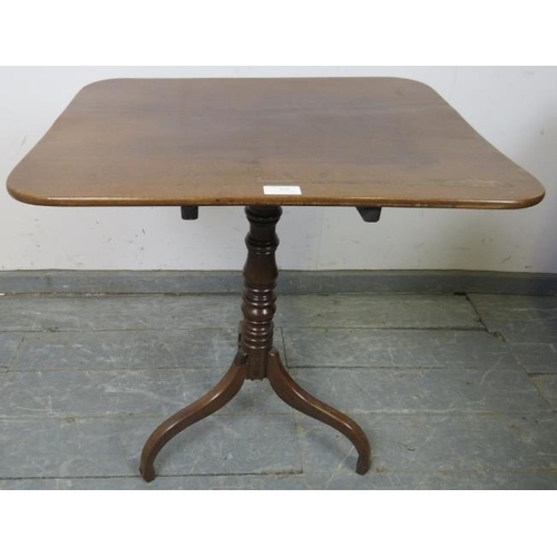 850 - A Georgian mahogany rectangular tilt-top wine table on a turned column with spider legs. 
H70cm W61c... 