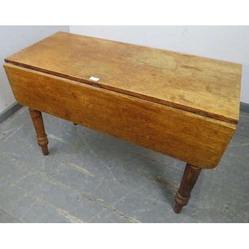 873 - A 19th century medium oak Pembroke table with single drawer, on tapering turned supports. 
H74cm W74... 