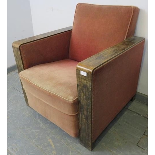 876 - An Art Deco Period oak show-wood armchair, upholstered in faded red velvet material, on block feet. ... 