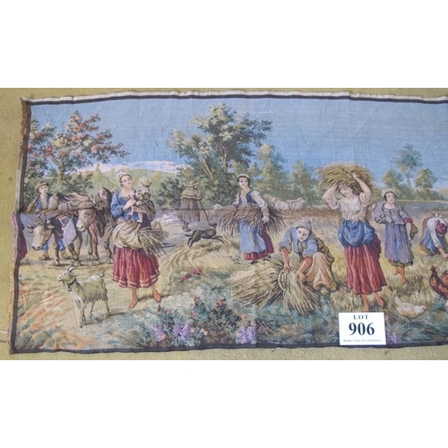 906 - A French style tapestry wall hanging, depicting rural country life. 204cm x 68cm.