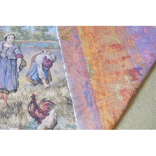 906 - A French style tapestry wall hanging, depicting rural country life. 204cm x 68cm.