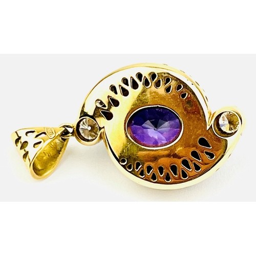 368 - A yellow metal amethyst & diamond pendant, bail marked 18ct. The cabochon cut amethyst approx 18mm x... 