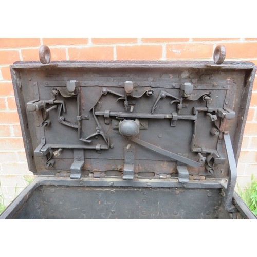 720A - A late 17th/early 18th century Armada chest, of cast iron strapwork construction, the lid with 7-poi... 