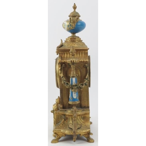 101 - A French ormolu and porcelain mantle clock, 19th century. Modelled in the Neoclassical style with ha... 