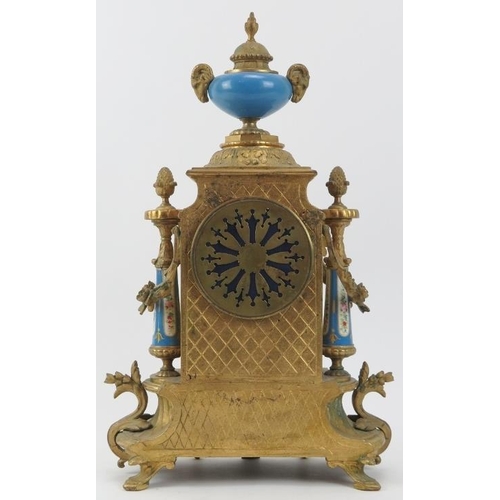 101 - A French ormolu and porcelain mantle clock, 19th century. Modelled in the Neoclassical style with ha... 