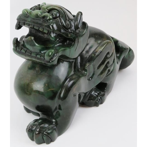 108 - A very large decorative Chinese hard stone carving of a winged mythical beast, late 20th century. Si... 