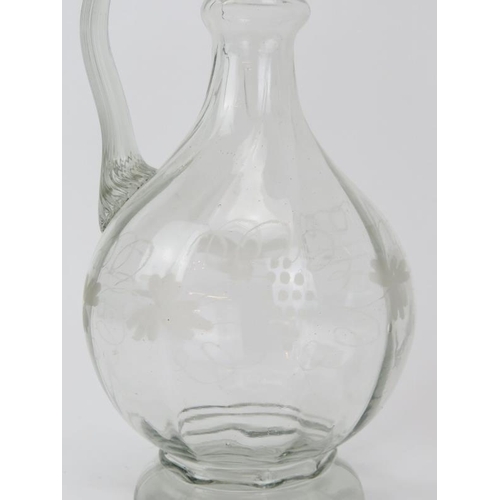 111 - A pair of Victorian clear glass decanters. With original stoppers. Decorated with a swirling stripe ... 