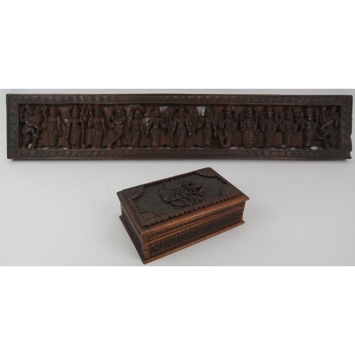 122 - Two Indian carved wood objects,  20th century. Comprising an ornately carved box with hidden sliding... 