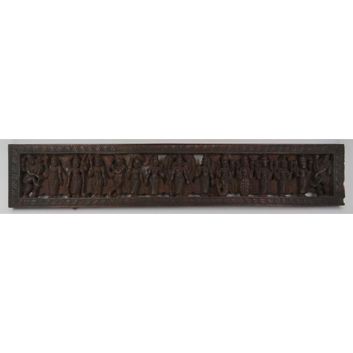 122 - Two Indian carved wood objects,  20th century. Comprising an ornately carved box with hidden sliding... 