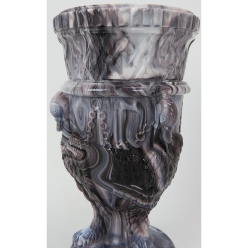 127 - A Victorian Edward Moore & Co pressed glass urn. Modelled in marbled malachite purple with three int... 