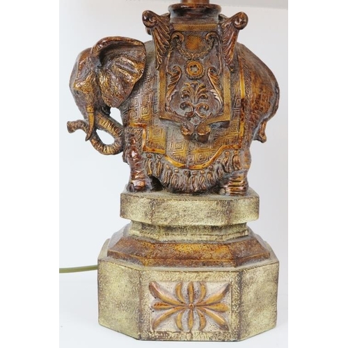 128 - A European pair of decorative Indian elephant table lamps, 20th century. (2 items) 53 cm total heigh... 