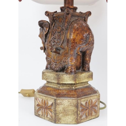 128 - A European pair of decorative Indian elephant table lamps, 20th century. (2 items) 53 cm total heigh... 